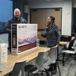 Attendee winning a 4K external monitor